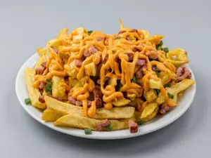 Papas fritas con cheddar
