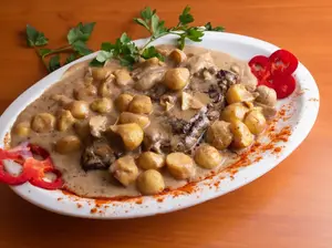 Cuarto de pollo champignon