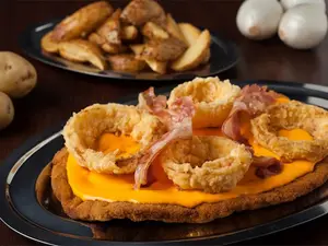 Milanesa cheddar con fritas