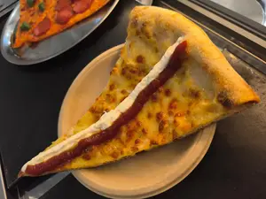 Porción pizza capra y miele