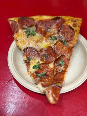 Porción pizza pepperoni