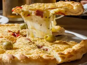 PORCION MUZZA RELLENA