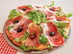 Rúcula y tomate