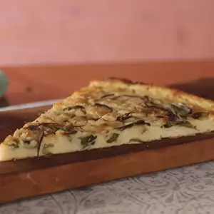 Faina cebolla y verdeo porción
