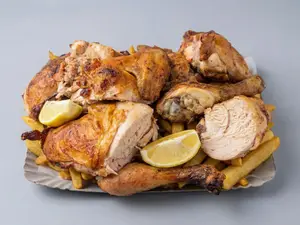 Pollo entero con fritas