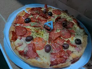 Porción de pepperoni