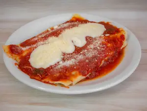 Canelones con salsa