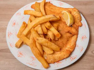 Suprema con papas fritas