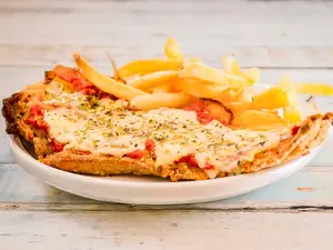 Mila de carne/pollo napolitana