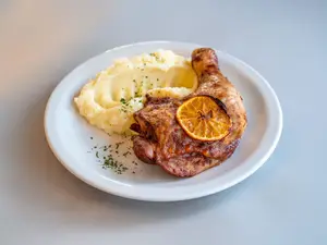 Pata muslo a la naranja