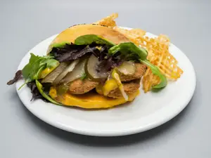 Sandwich milanesa melena león