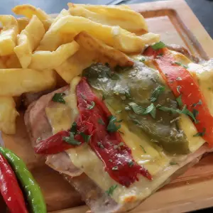 Mat. ternera a la pizza