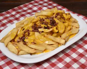 Papas fritas c cheddar y bacon