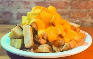 Papas con cheddar