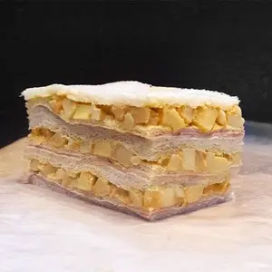 Sándwich triple de jamón y palmitos