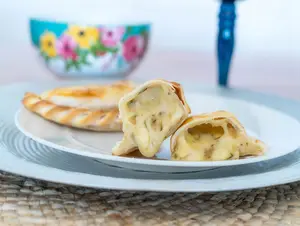 Emp. horno de queso y cebolla
