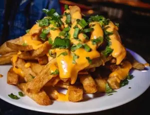 Papas fritas al verdeo