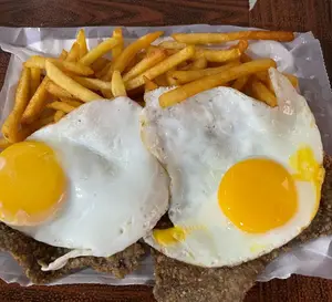Milanesa A Caballo Con Fritas