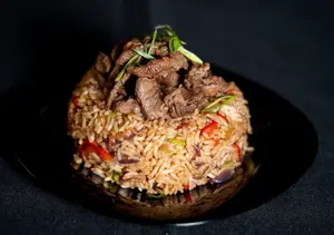 Wok de arroz con cerdo