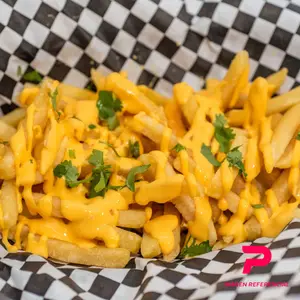 Papas fritas con cheddar