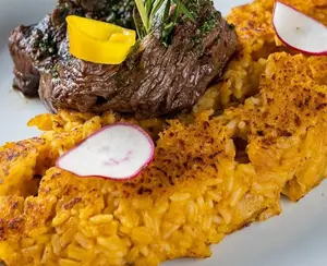 Tacu tacu con seco de carne