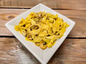 Fetuccini mariscos a la crema