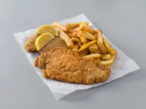Mila de pollo con guarnición
