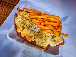 Napo de pollo c/guarnición