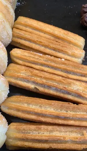 6 churros rellenos con dulce