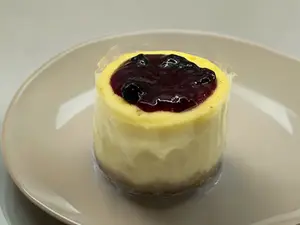 Porcion torta cheesecake f.r