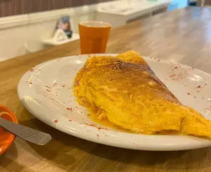 Omelette de champiñones