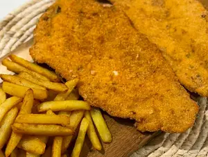 Milanesa de ternera + guarnicion
