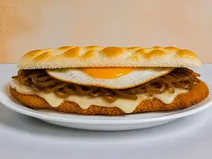 Sandwich milanesa cebolla caramelizada