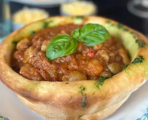 Ñoquis de papa bolognesa