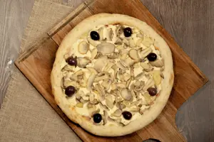 Pizza jamón y champignones