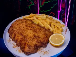 Milanesa con papas fritas