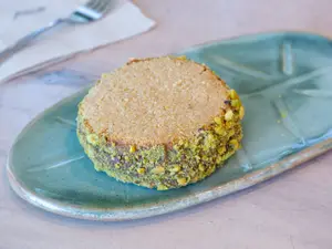Alfajor almendra y pistacho