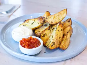 Papas Rusticas con Queso Crema