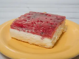 Porción cheesecake