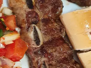 1/2 porción de asado con guarn