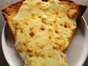 Fainá con queso