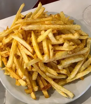 1/2 porción de papas fritas