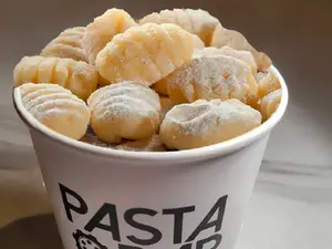 Ñoquis de papa + salsa + queso