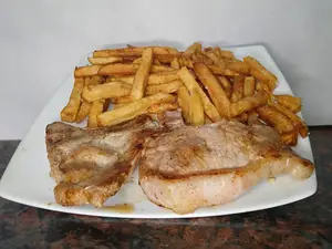 Carre De Cerdo Con Guarnicion