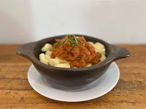 Ñoquis de papa bolognesa
