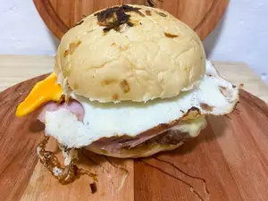 Burger la mano de dios