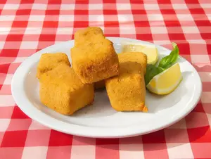 Daditos de muzzarella a la milanesa