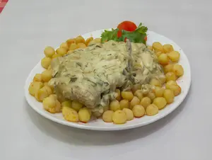 Suprema con crema de verdeo