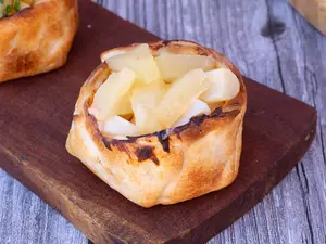Empanada palmitos con ananá