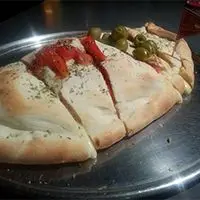 Calzone con jamón y morrón